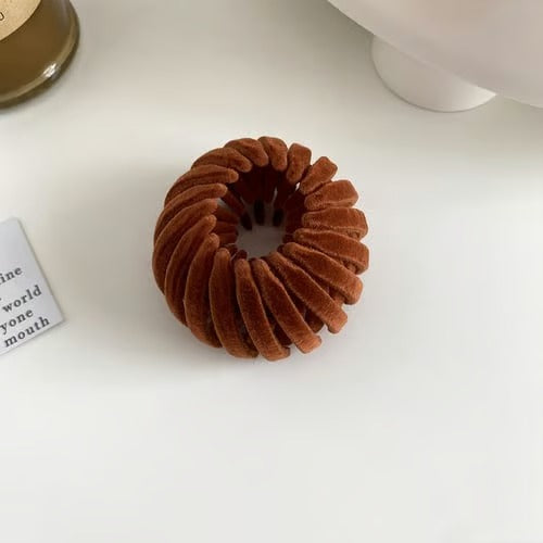 LuxeTwist™ – Mühelose Eleganz den ganzen Tag mit perfekten Duttfrisuren in Sekunden