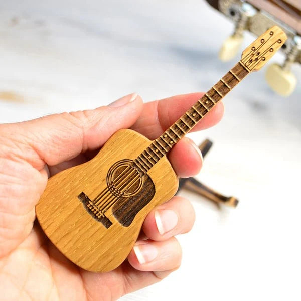 GuitarHolder™ - Gitarrenplektrenhalter +3 Gratis Plektren