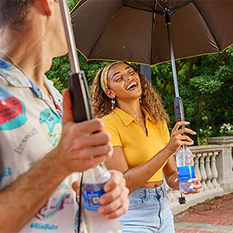 Breezella™ - Sprüh-Fan-Regenschirm