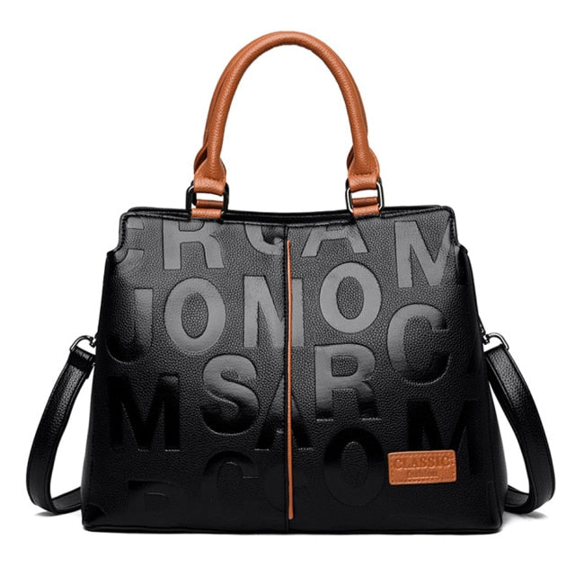 Rote und schwarze Ledertasche